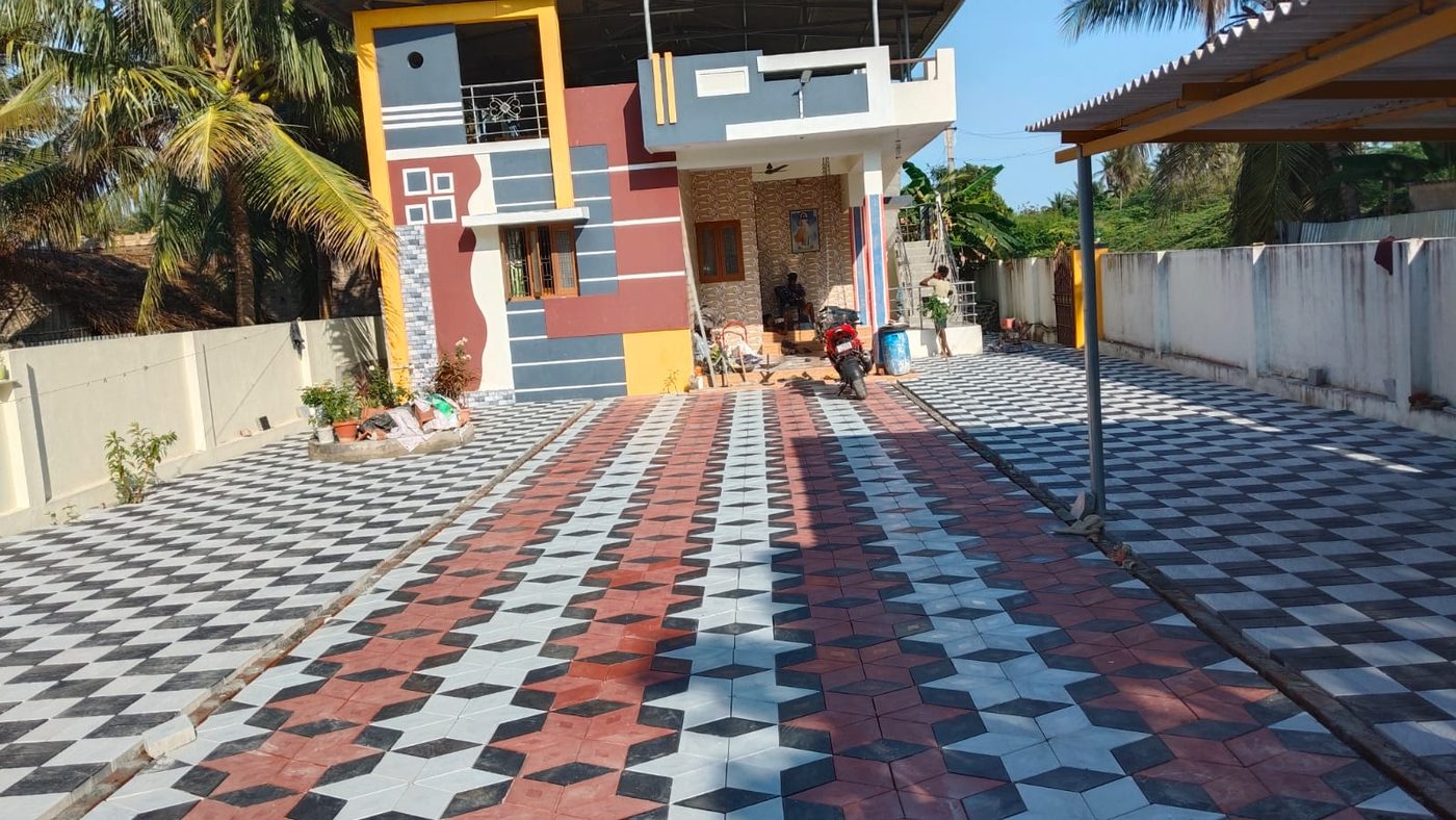 Driveway with red, black and white 3D cube tiles