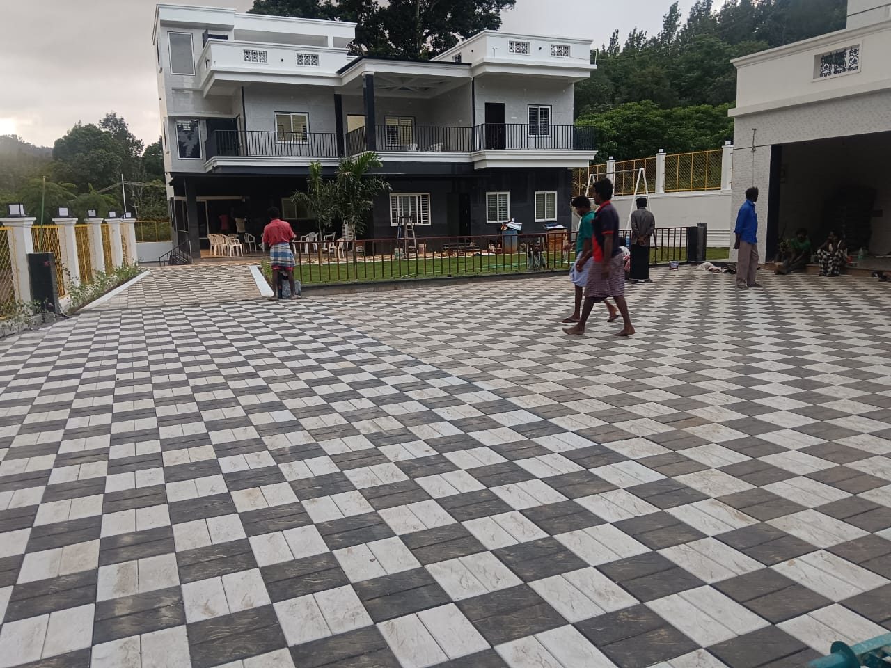 House front with black and white rectangle tiles